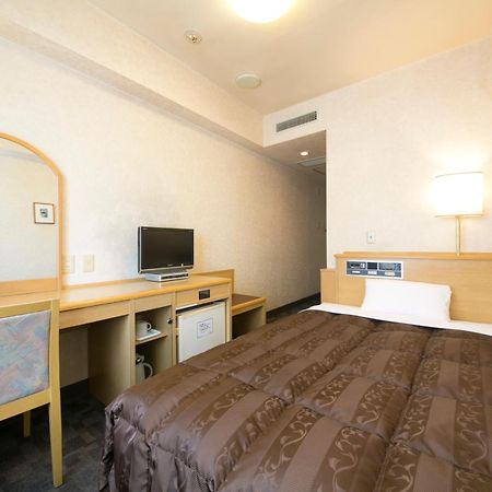Kuwana Green Hotel Room photo
